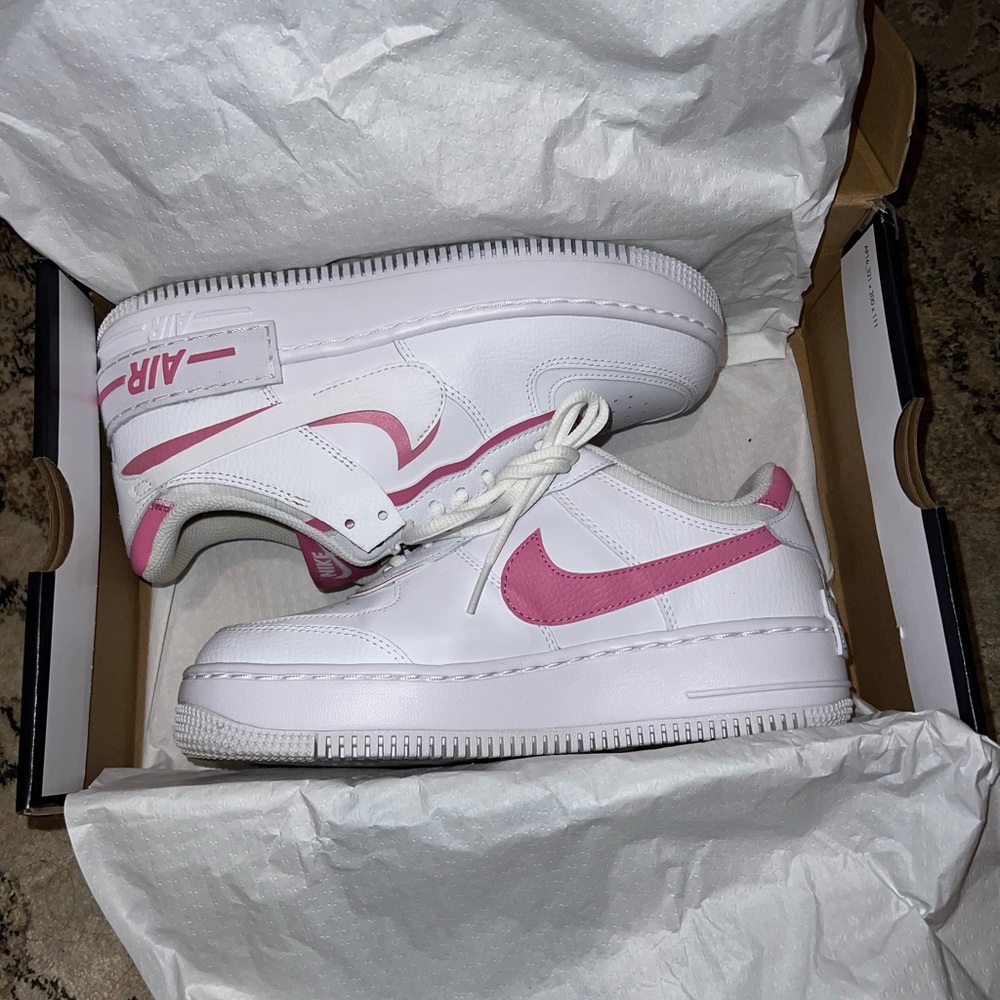 Nike Women’s White Sneakers with Pink Swoosh